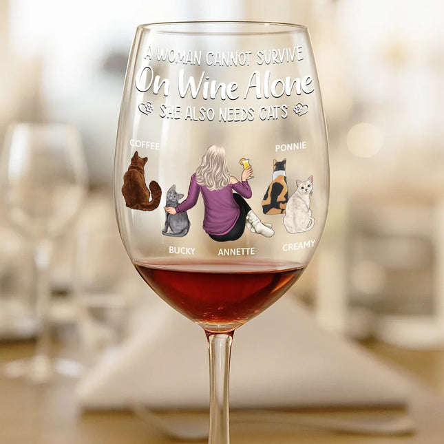 A Woman Cannot Survive On Wine Alone Cat Mom Cat Dad - Personalized Wine Glass