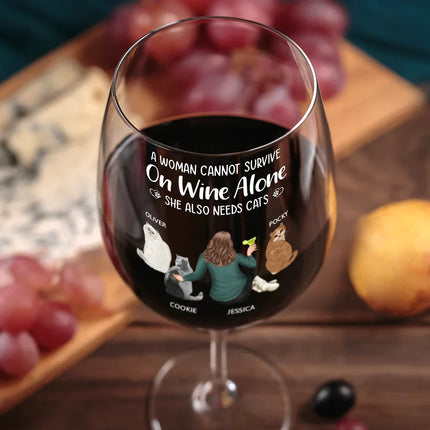A Woman Cannot Survive On Wine Alone Cat Mom Cat Dad - Personalized Wine Glass