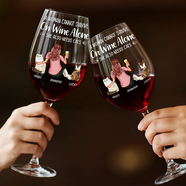A Woman Cannot Survive On Wine Alone Cat Mom Cat Dad - Personalized Wine Glass